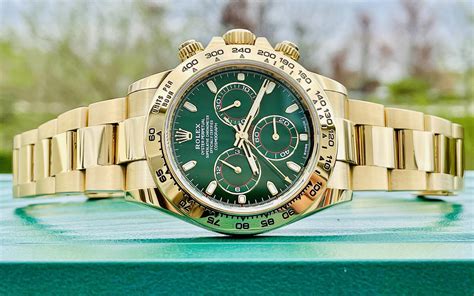 Rolex gold daytona green dial